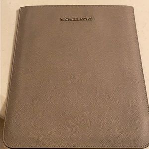 Michael Kors iPad case with stain as shown on back